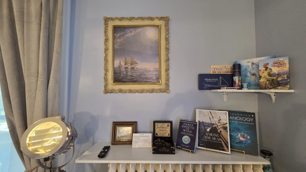 Nautical themed books, games and decor in a king room at the Goose Crown Inn in Stoughton, WI