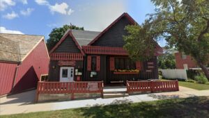 Sons of Norway Mandt Lodge in Stoughton WI, brown cottage with red trim.