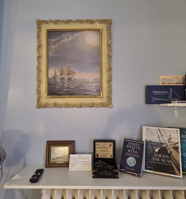 Nautical themed books, games and decor in a king room at the Goose Crown Inn in Stoughton, WI