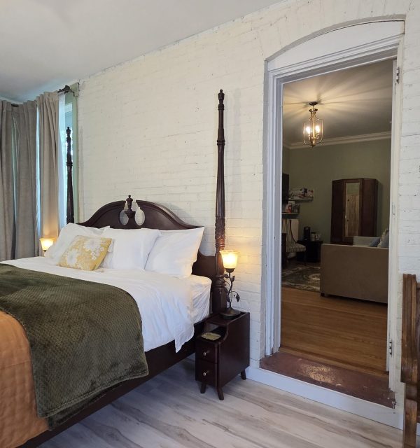 Sun room king bed and birch floors, Sanctuary Suite in the Goose Crown Inn